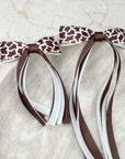 Cow Print Florence Tassel Bow