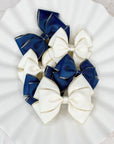 Sparkly Edge Bebe Baby Bows