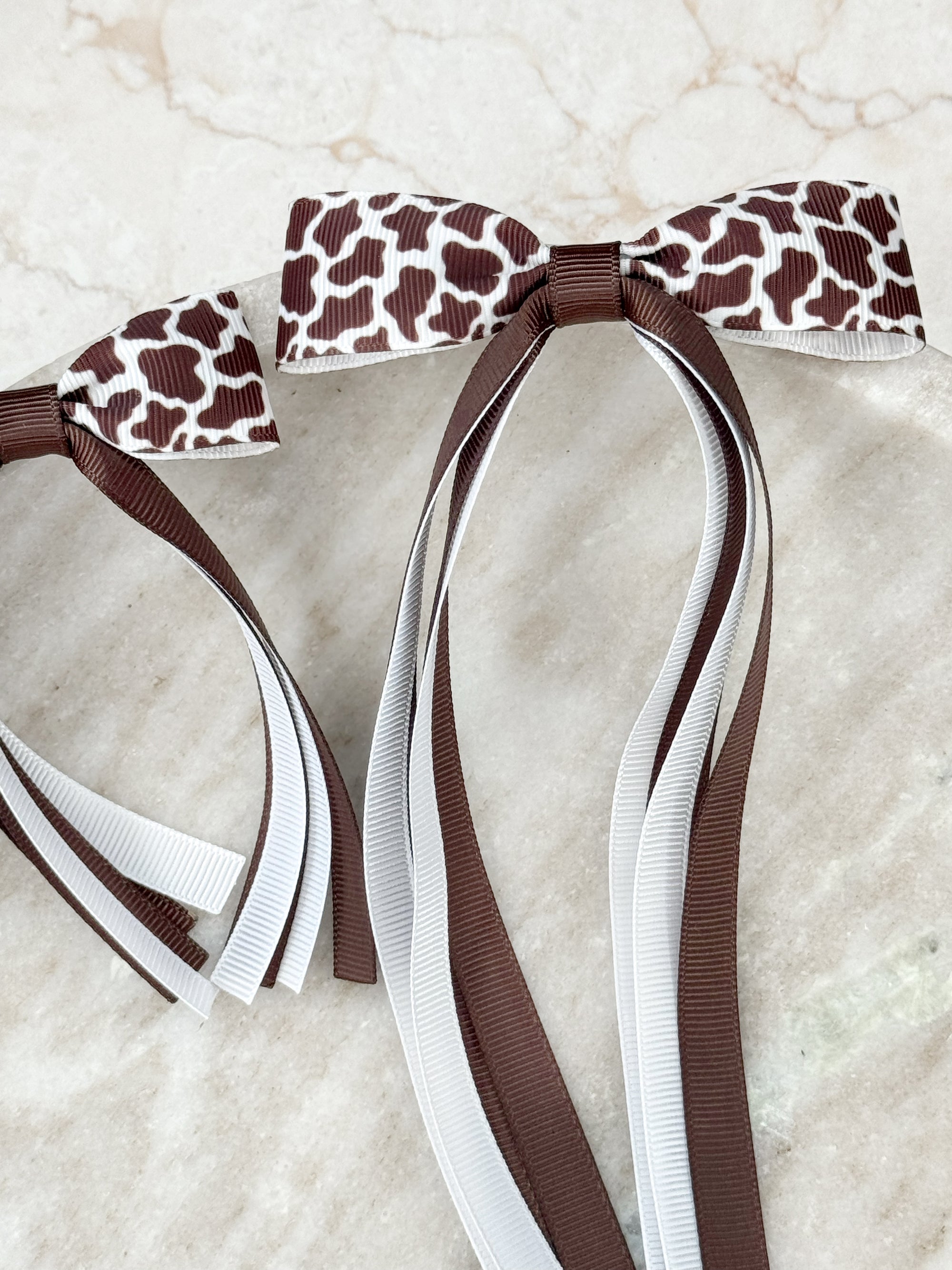Cow Print Florence Tassel Bow