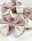Cinnamon Swirl Capri Baby Bow