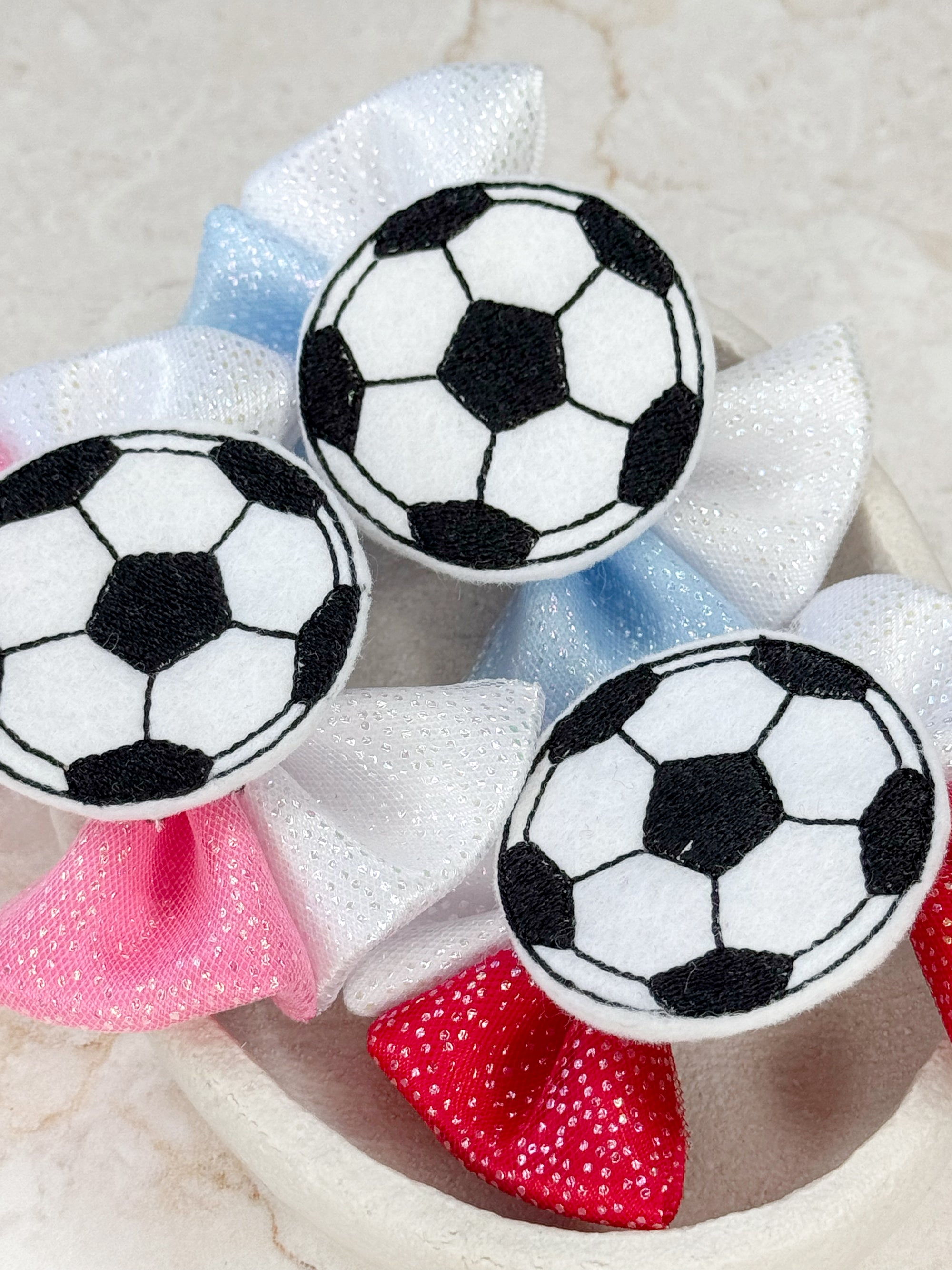 Kick About Capri Baby Bow