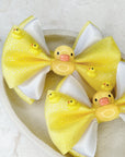 She’s No Ugly Duckling Bebe Baby Bow