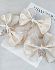 Pearls Of The Sea Bebe Baby Bow