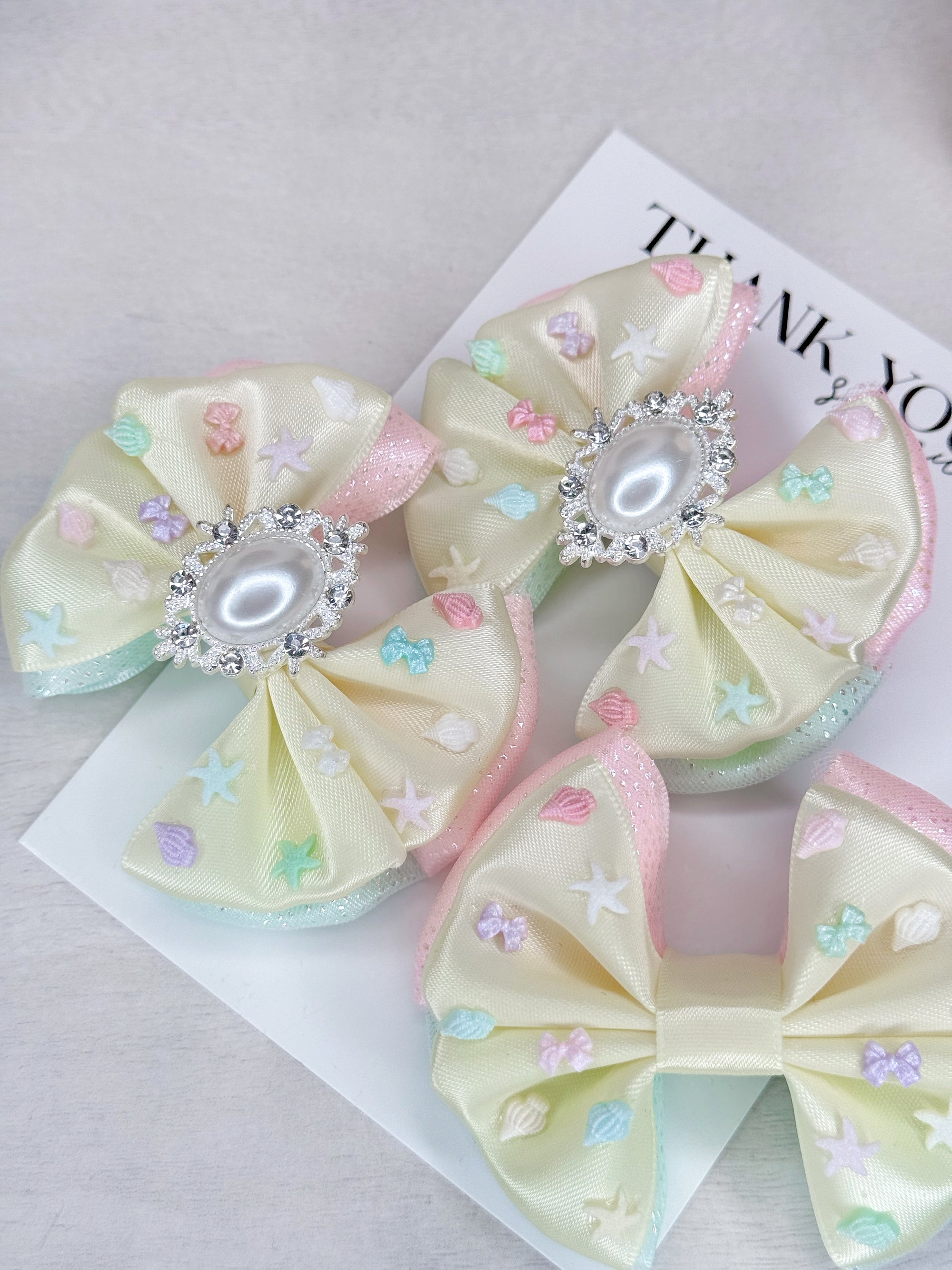 Sea Shells By The Sea Shore Capri Baby Bow
